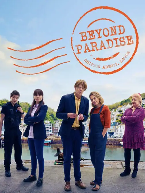 a group of people standing on a ledge